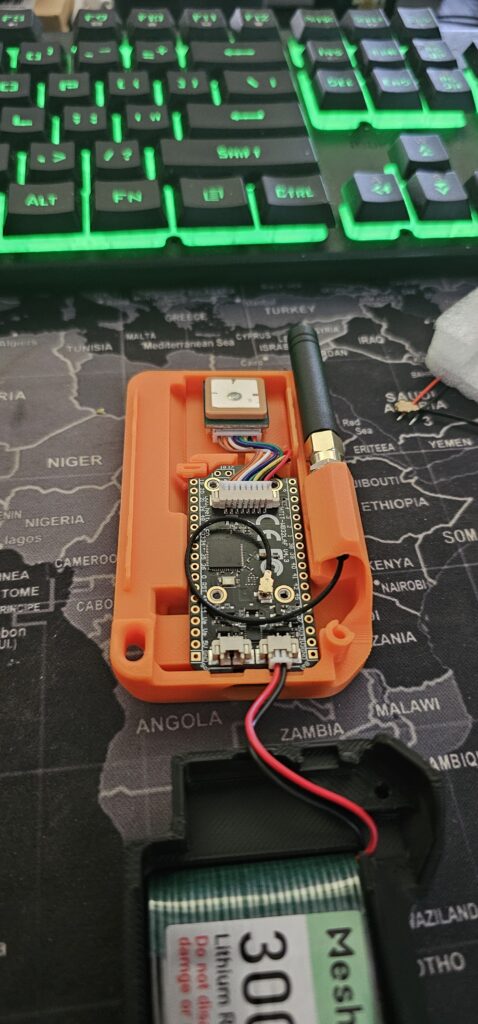 Best Stud Finder For Tile Walls A vertical view of the MESHNOLOGY LoRa V4 Development Board after being connected to the battery.